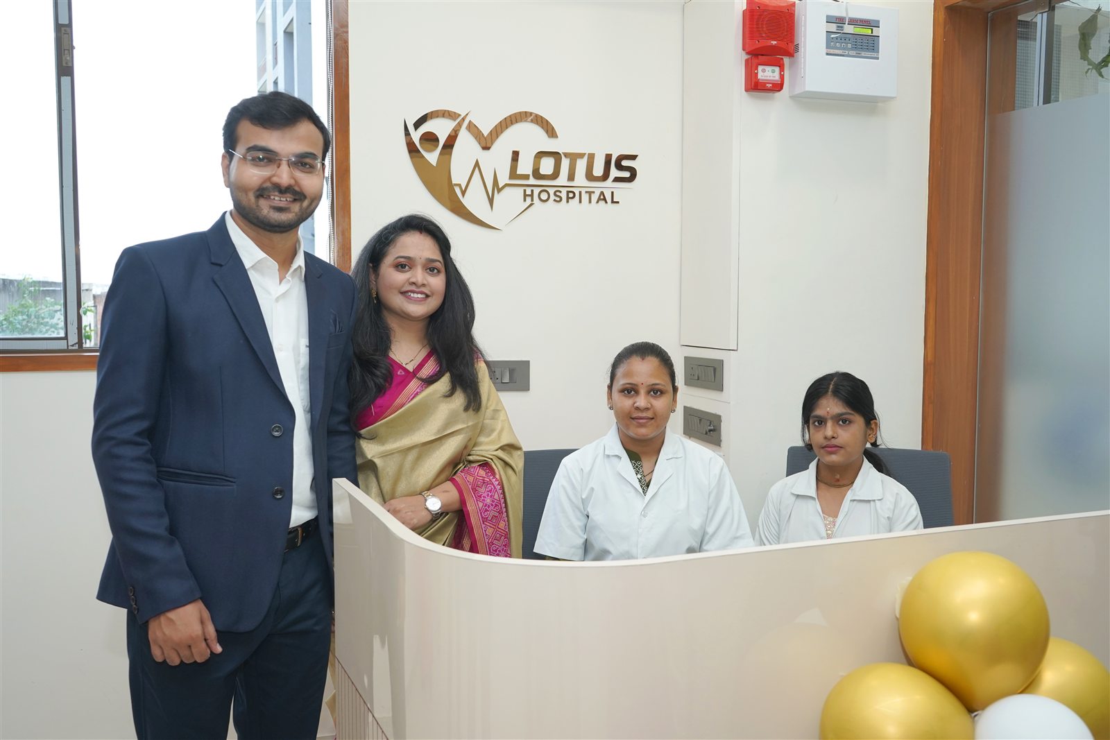Reception desk and staff at Lotus Hospital