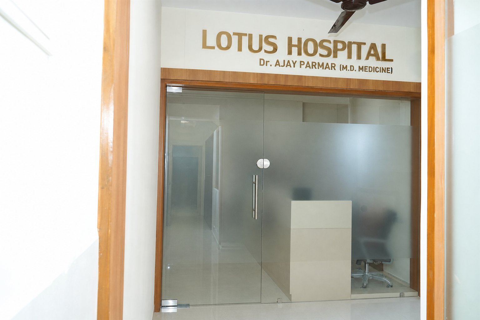 Main entrance and front desk at Lotus Hospital